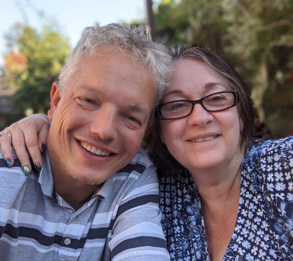 Liza Aldridge and her husband Dan smiling and looking relaxed